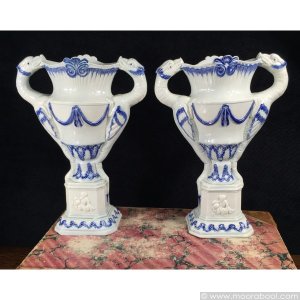 Pair of pearlware 'dragon' vases with cherubs, circa 1800