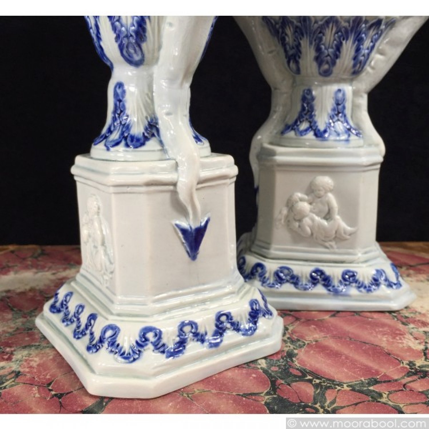 Pair of pearlware 'dragon' vases with cherubs, circa 1800