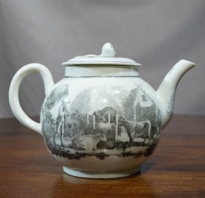 Rare Worcester teapot, 'Farmyard Scene', 'Milkmaids' prints in black, circa 1760 