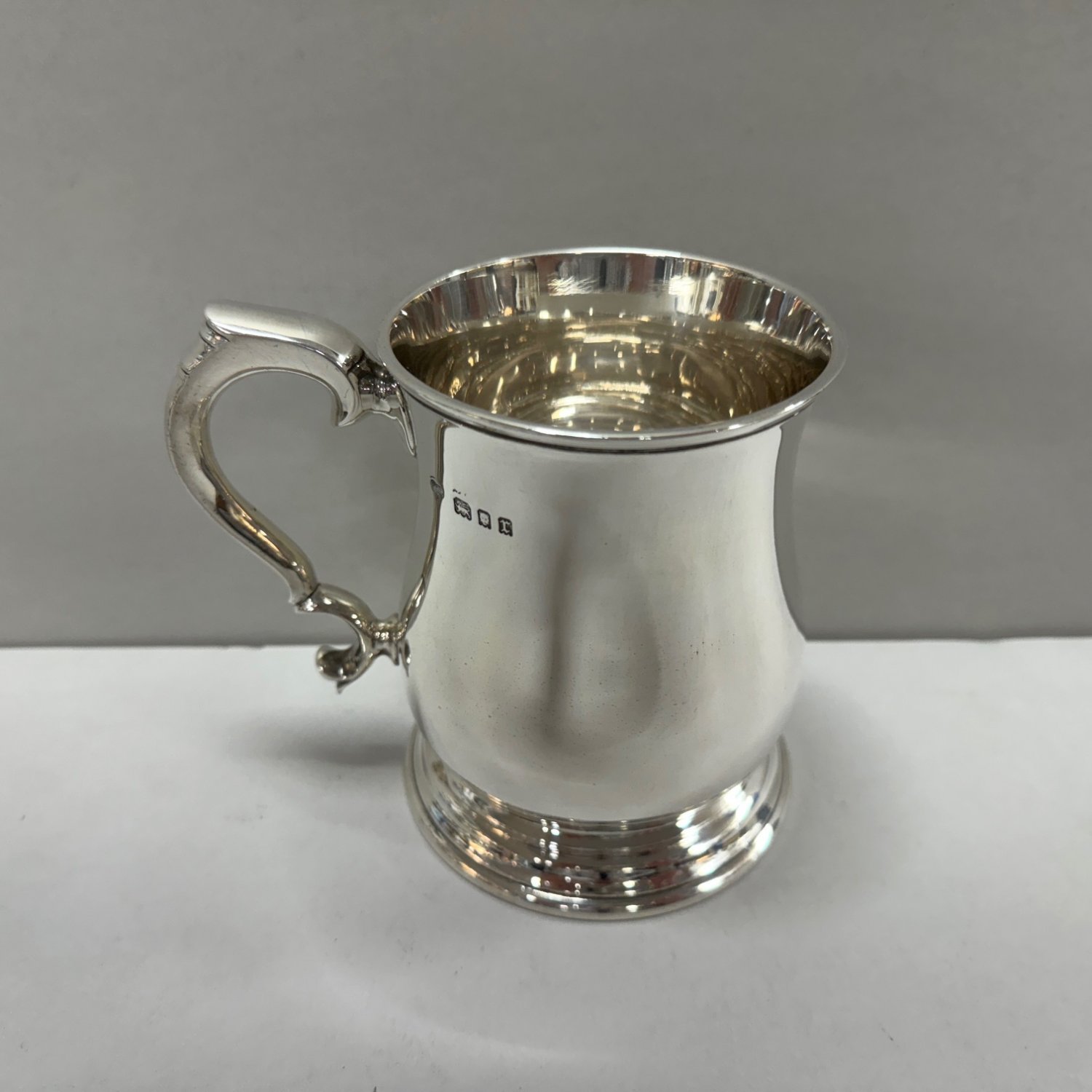 A Sterling Silver Baluster Shape Pint Tankard 