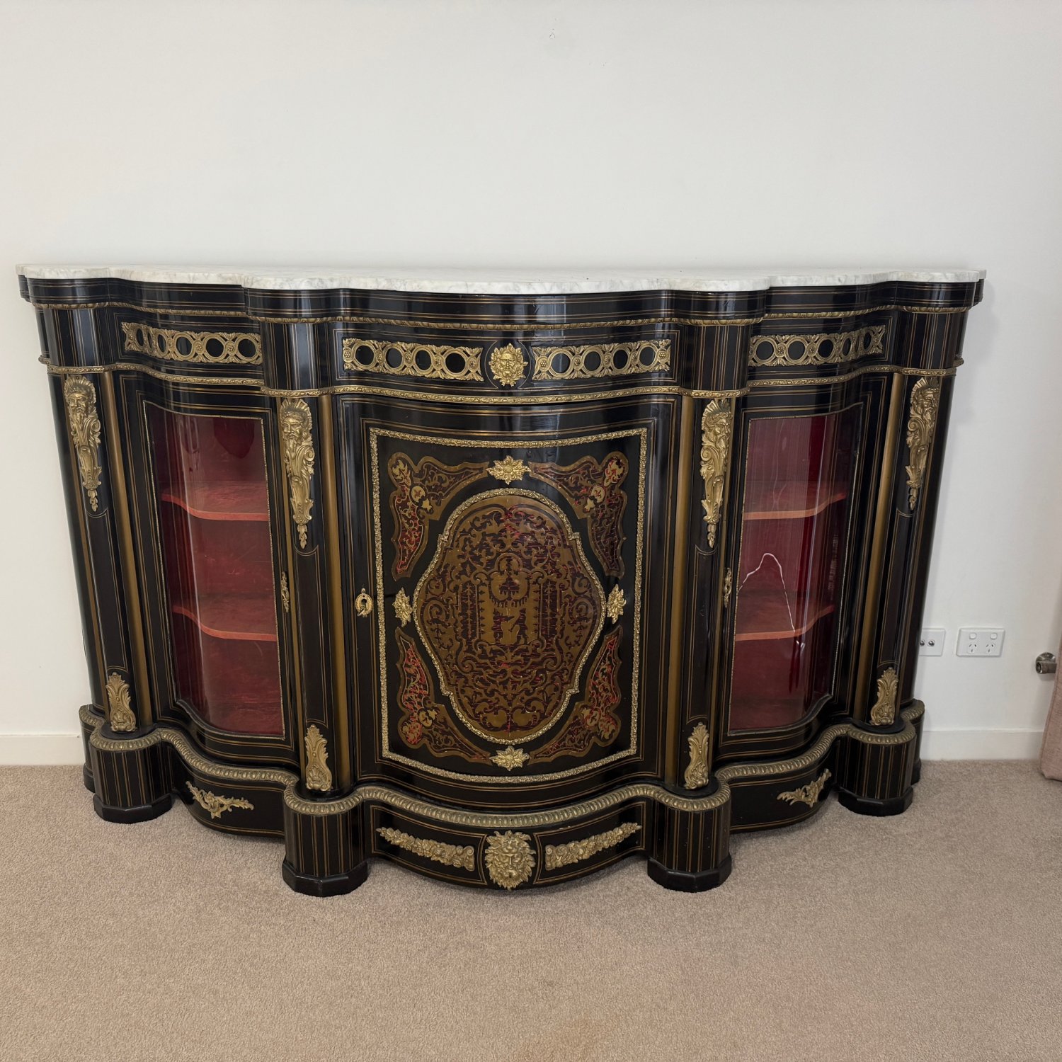 A Fine 19th Century Ebonised Serpentine Shape Credenza