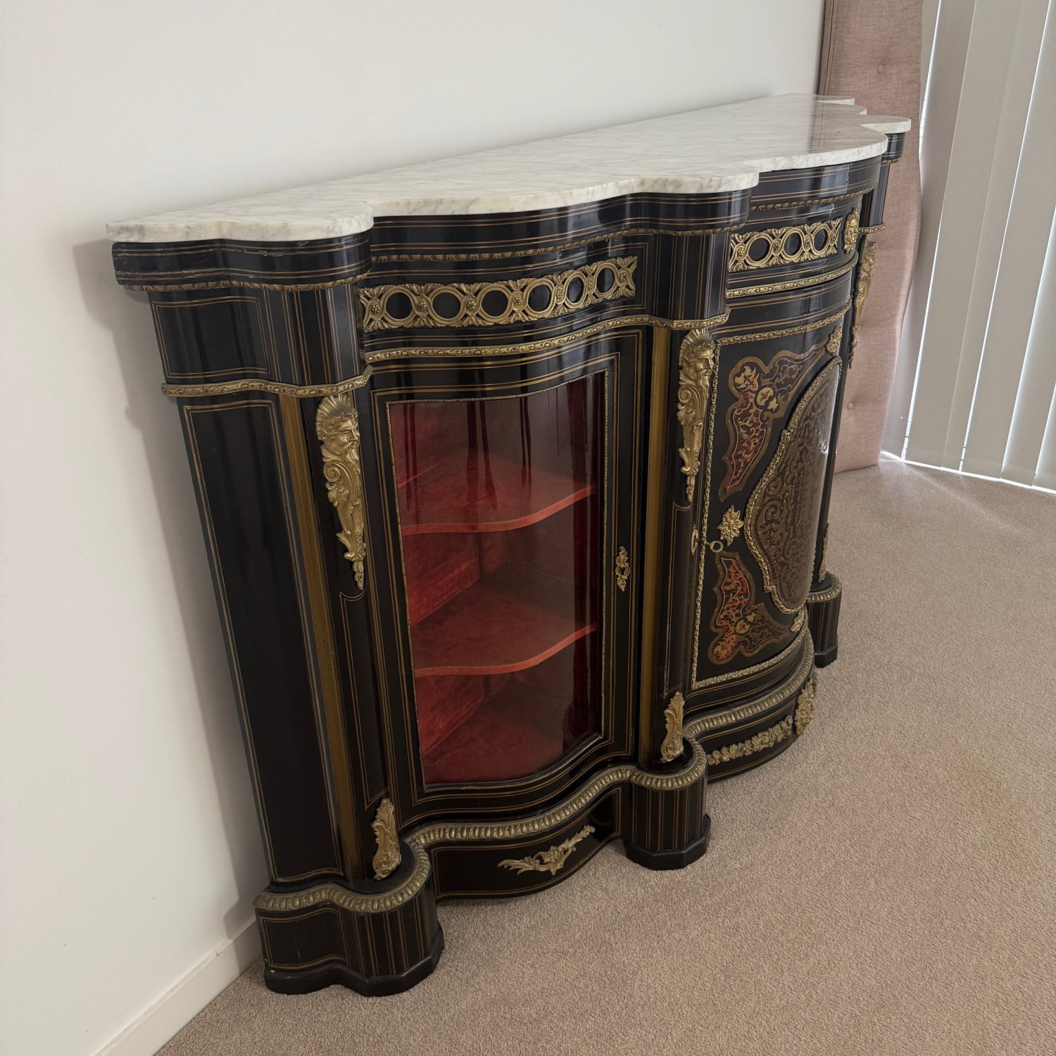 A Fine 19th Century Ebonised Serpentine Shape Credenza