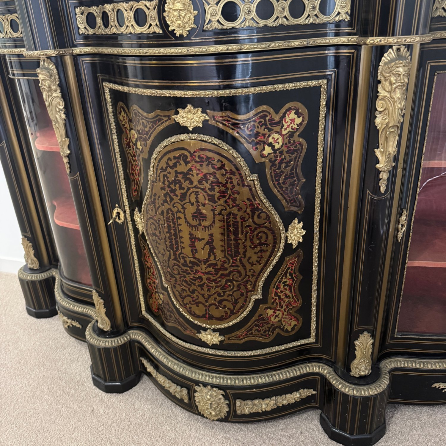 A Fine 19th Century Ebonised Serpentine Shape Credenza
