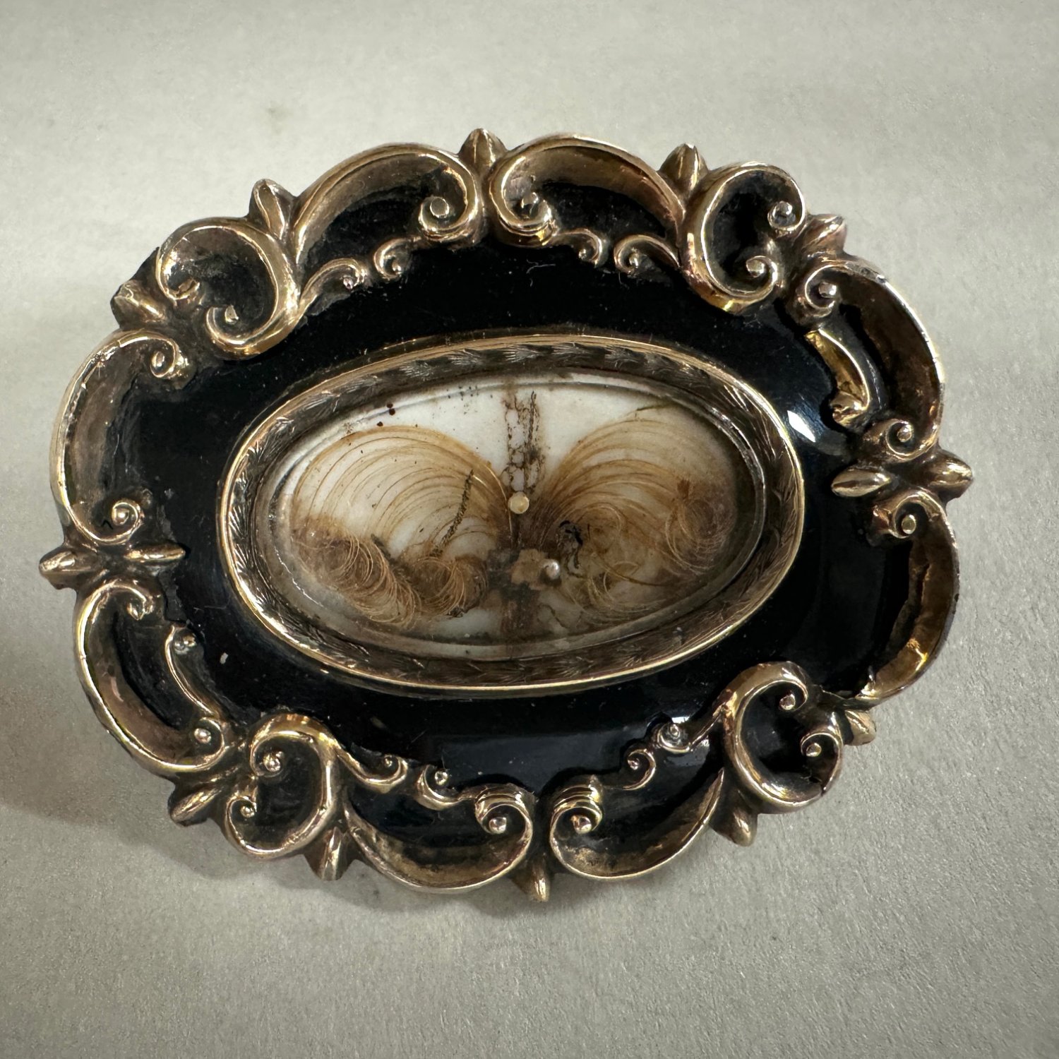 A Victorian 15ct. Gold and Enamel Mourning Brooch