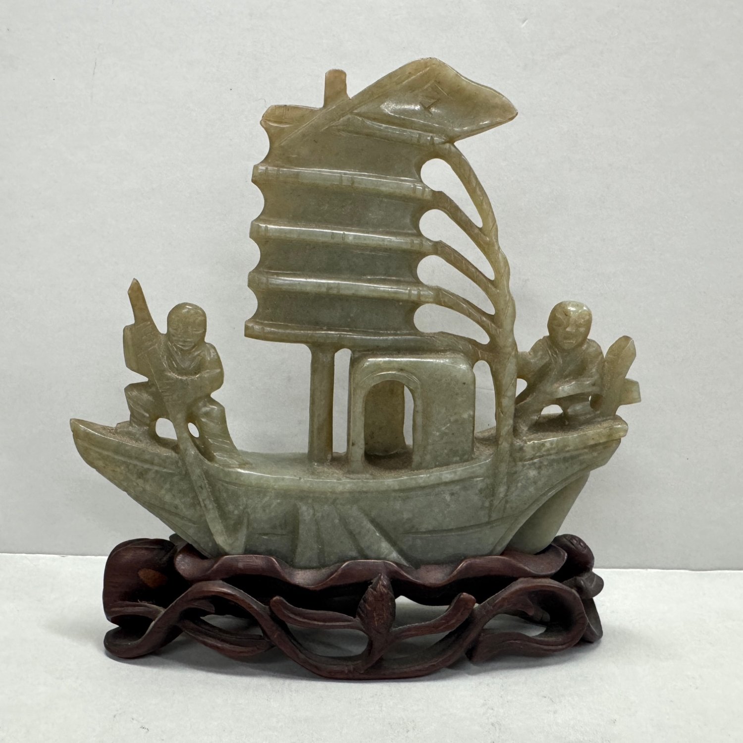 A Late Qing Dynasty Jade Sail Boat with Figures