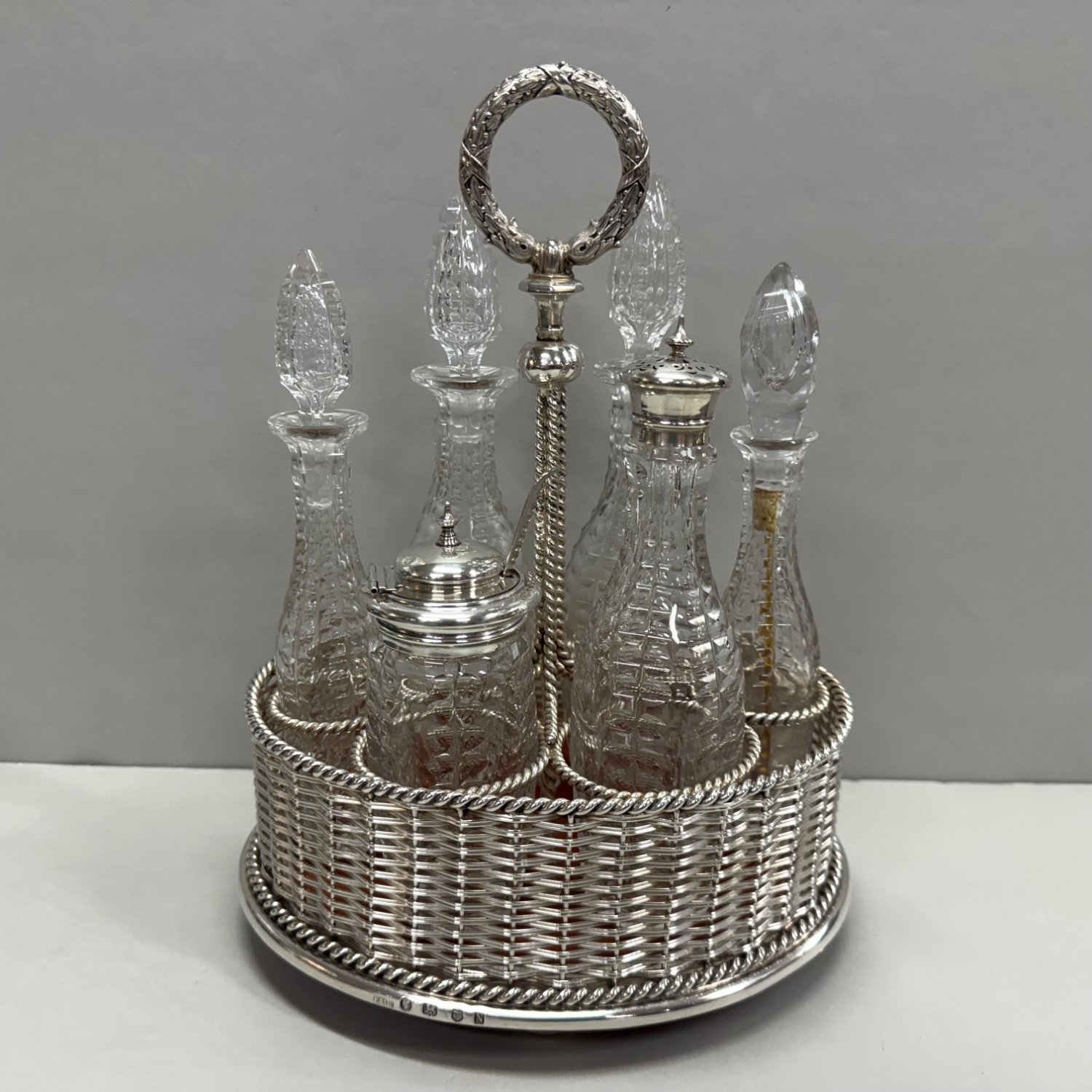 A Victorian Sterling Silver Cut Crystal 6 Bottle Cruet