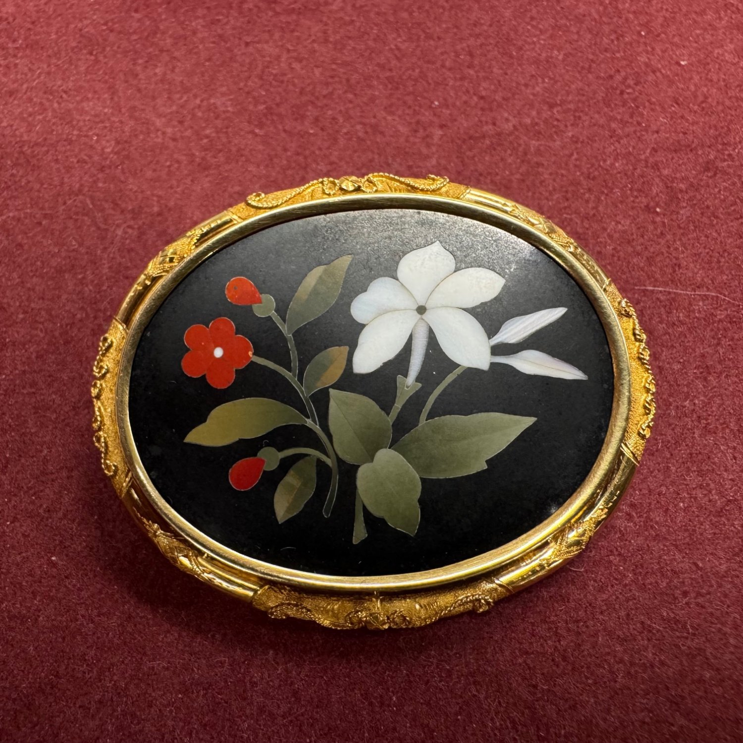 A Victorian Pietra Dura Brooch.