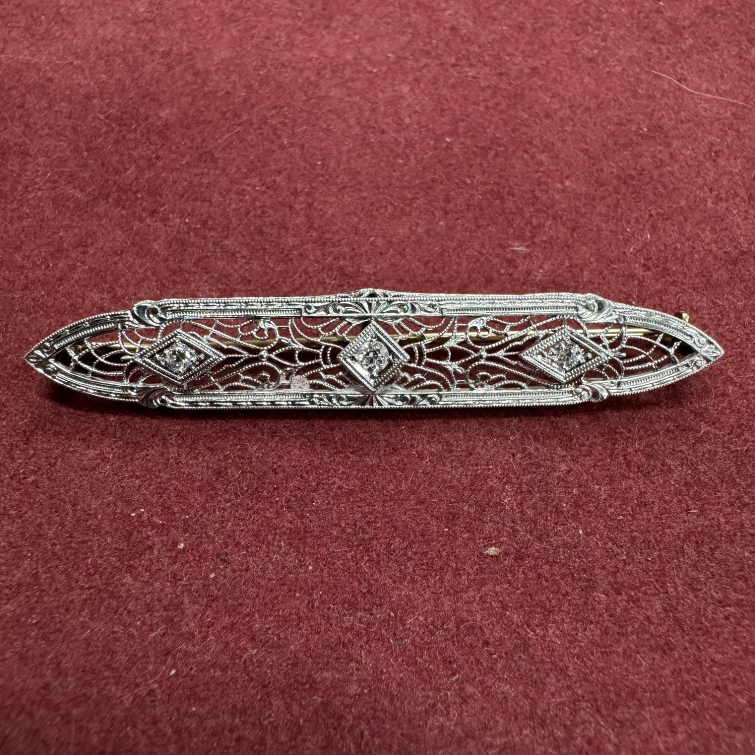 A Diamond Filigree Brooch.