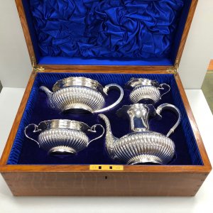 A Sterling Silver Oak Boxed Half Fluted Tea and Coffee Service