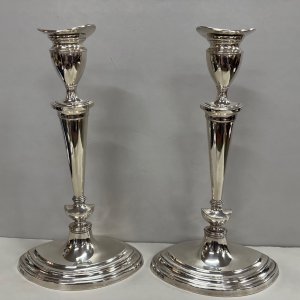 A Pair of Sterling Silver George III Style Candlesticks