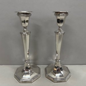 A Pair of Art Deco Sterling Silver Candlesticks