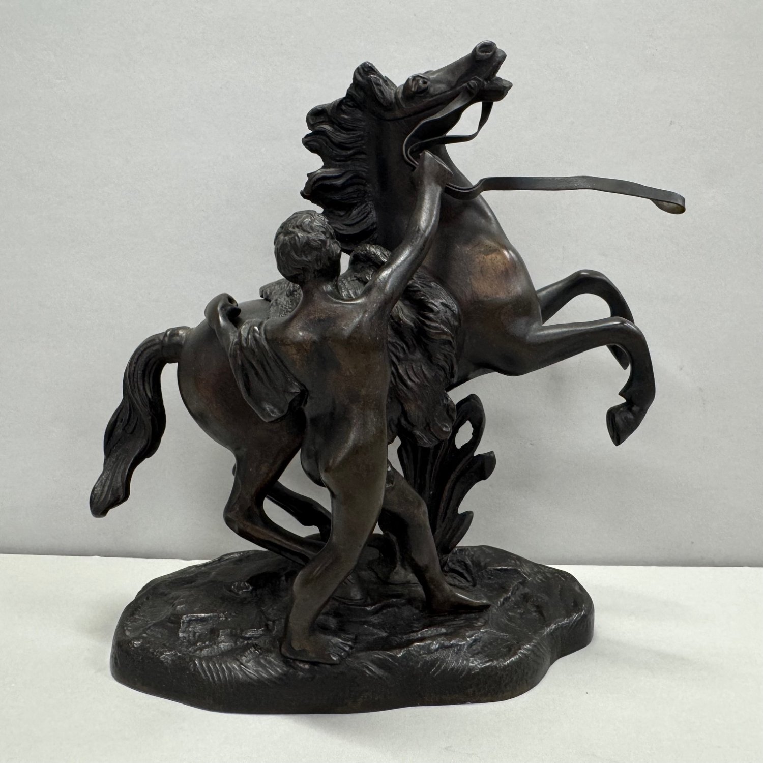 A 19th Century French Bronze Marly Horse and Handler Figurine.