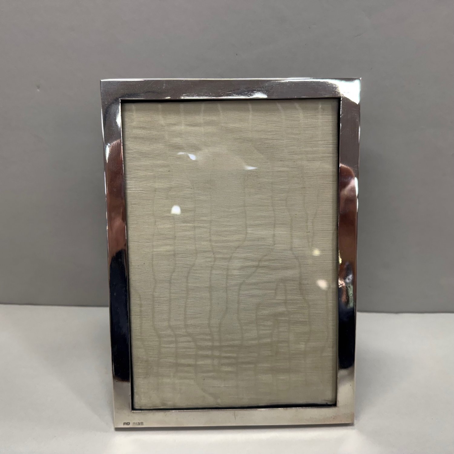 A Sterling Silver Rectangular Photograph Frame