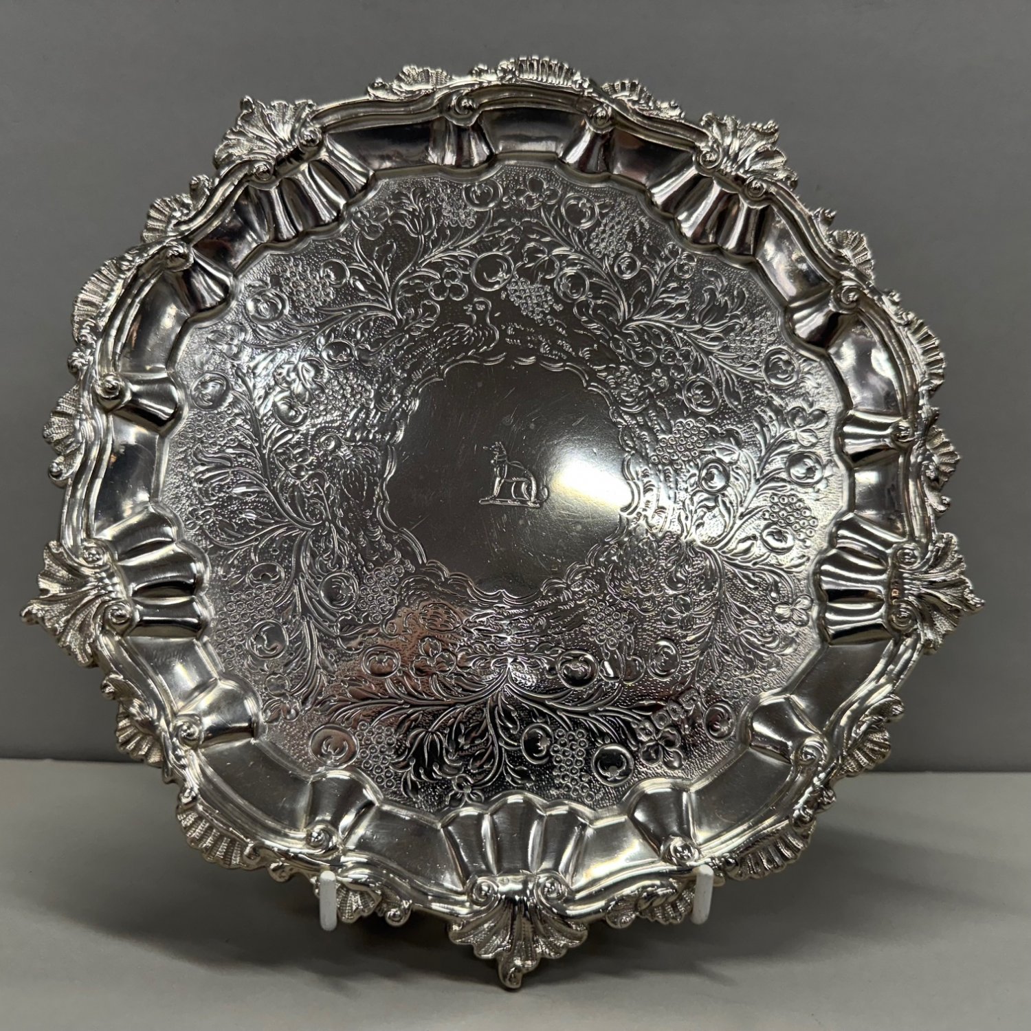 A George III Sterling Silver Crested Floral Engraved Salver