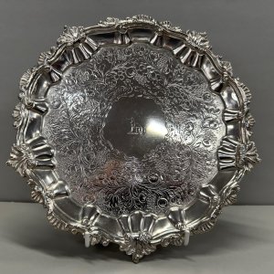 A George III Sterling Silver Crested Floral Engraved Salver