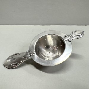 A Danish Sterling Silver Tea Strainer