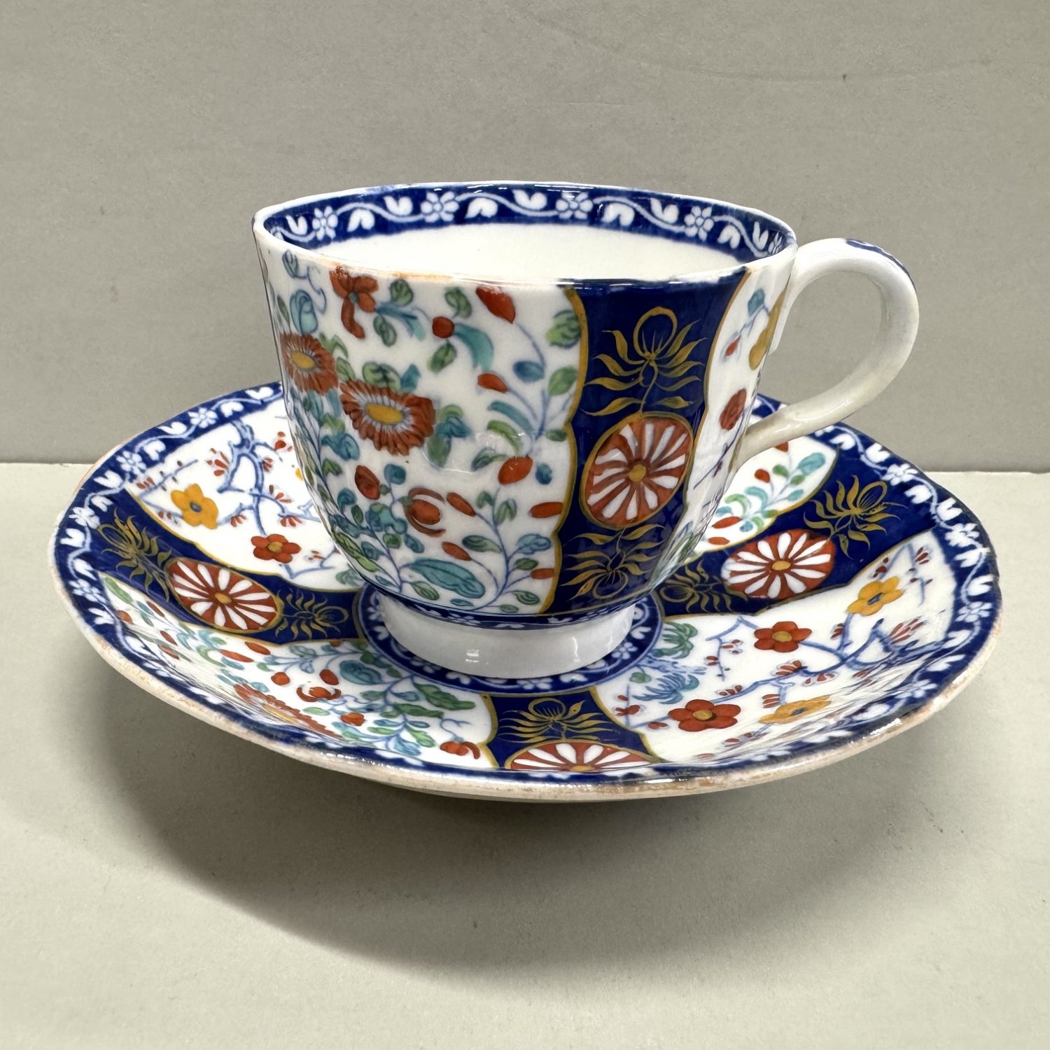 A 19th Century Queens Pattern Cup and Saucer.
