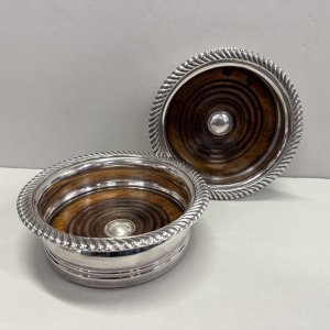 A Pair of George III Sheffield Plate Coasters. 