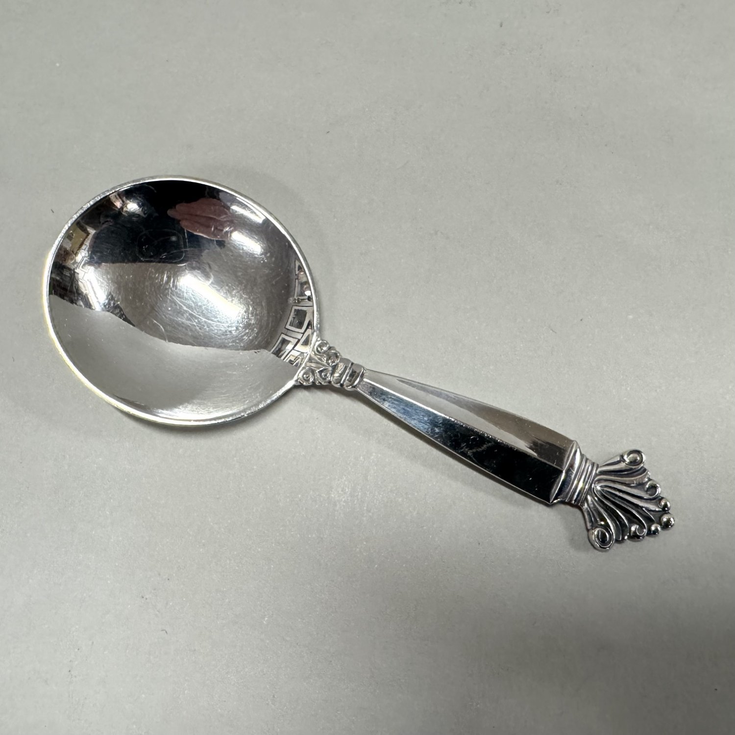 An early Georg Jensen Sterling Silver Tea Caddy Spoon.