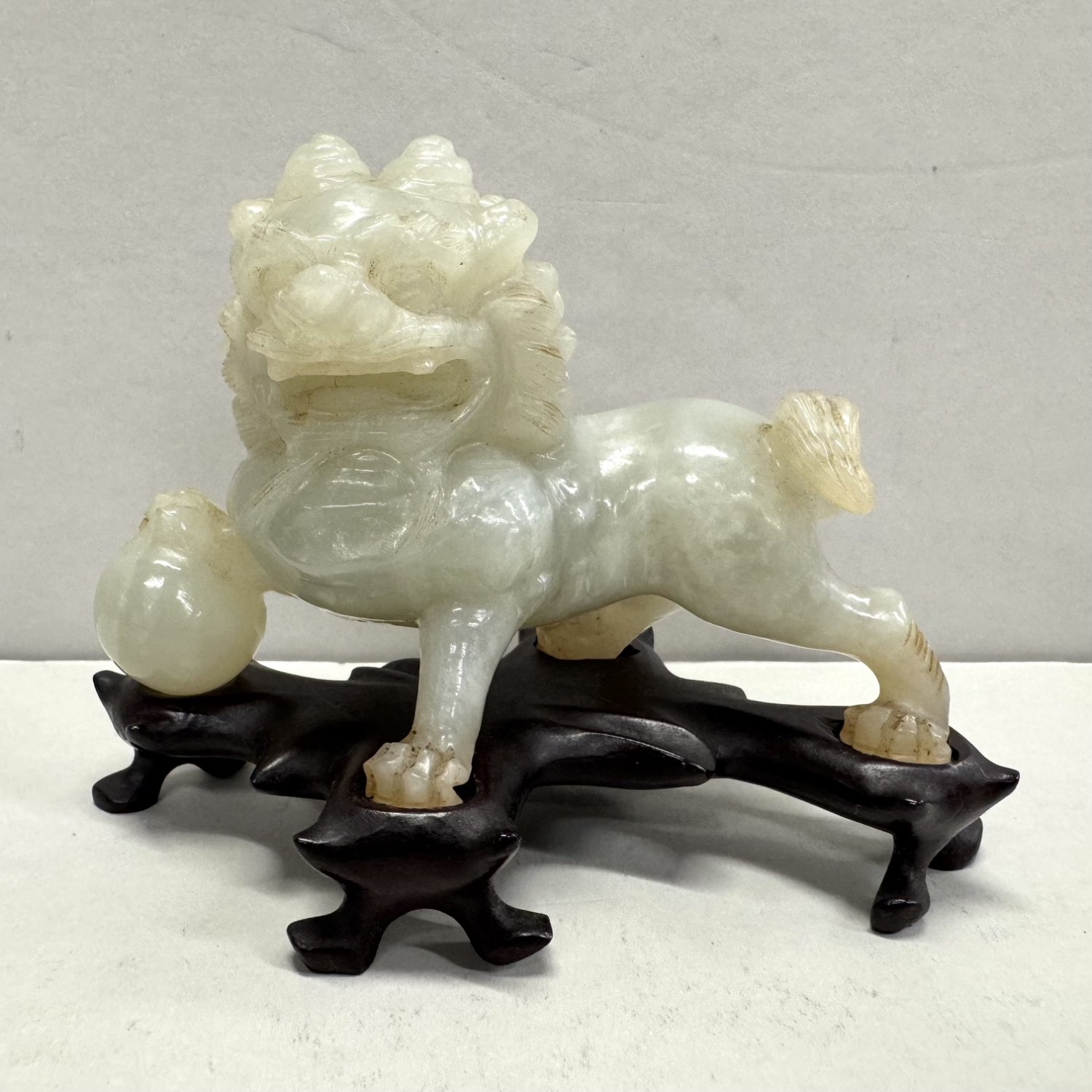 A Chinese Late Qing Dynasty Jade Foo Dog 