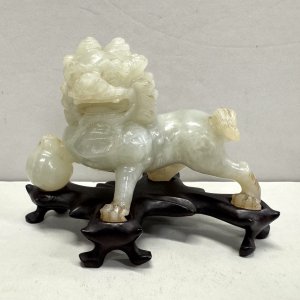 A Chinese Late Qing Dynasty Jade Foo Dog 