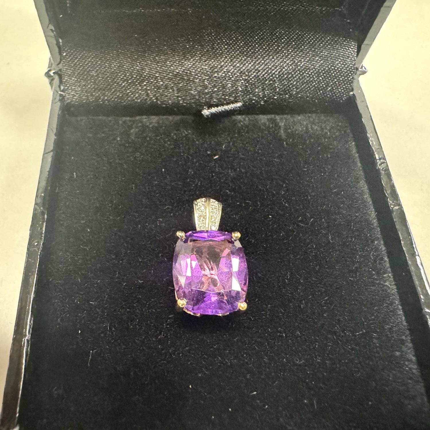A 14ct.Gold Amethyst and Diamond Pendant. 