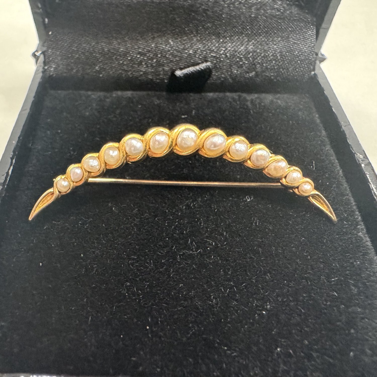 A 14ct. Gold and Pearl Brooch.
