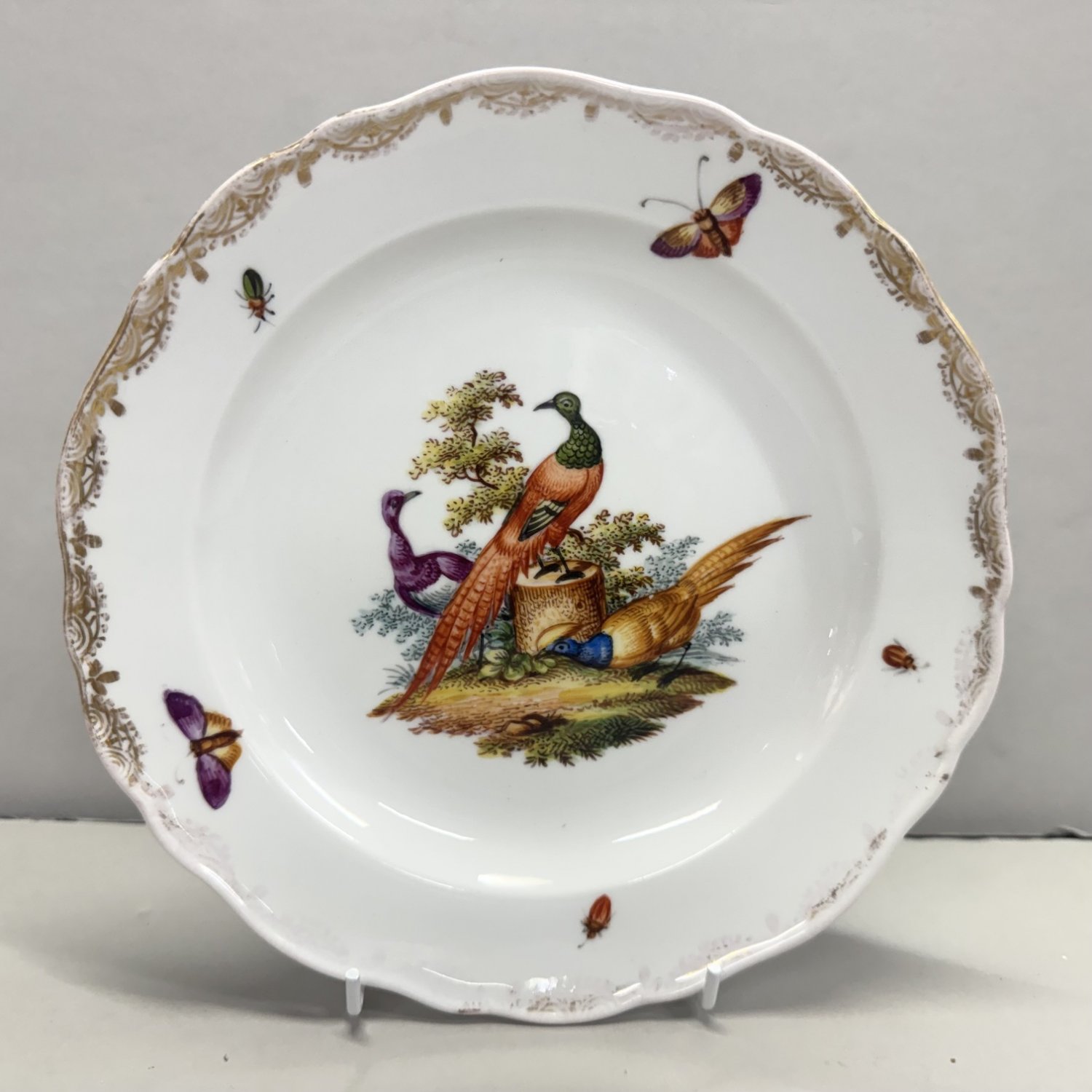 A Meissen Plate with Gilt Highlights.