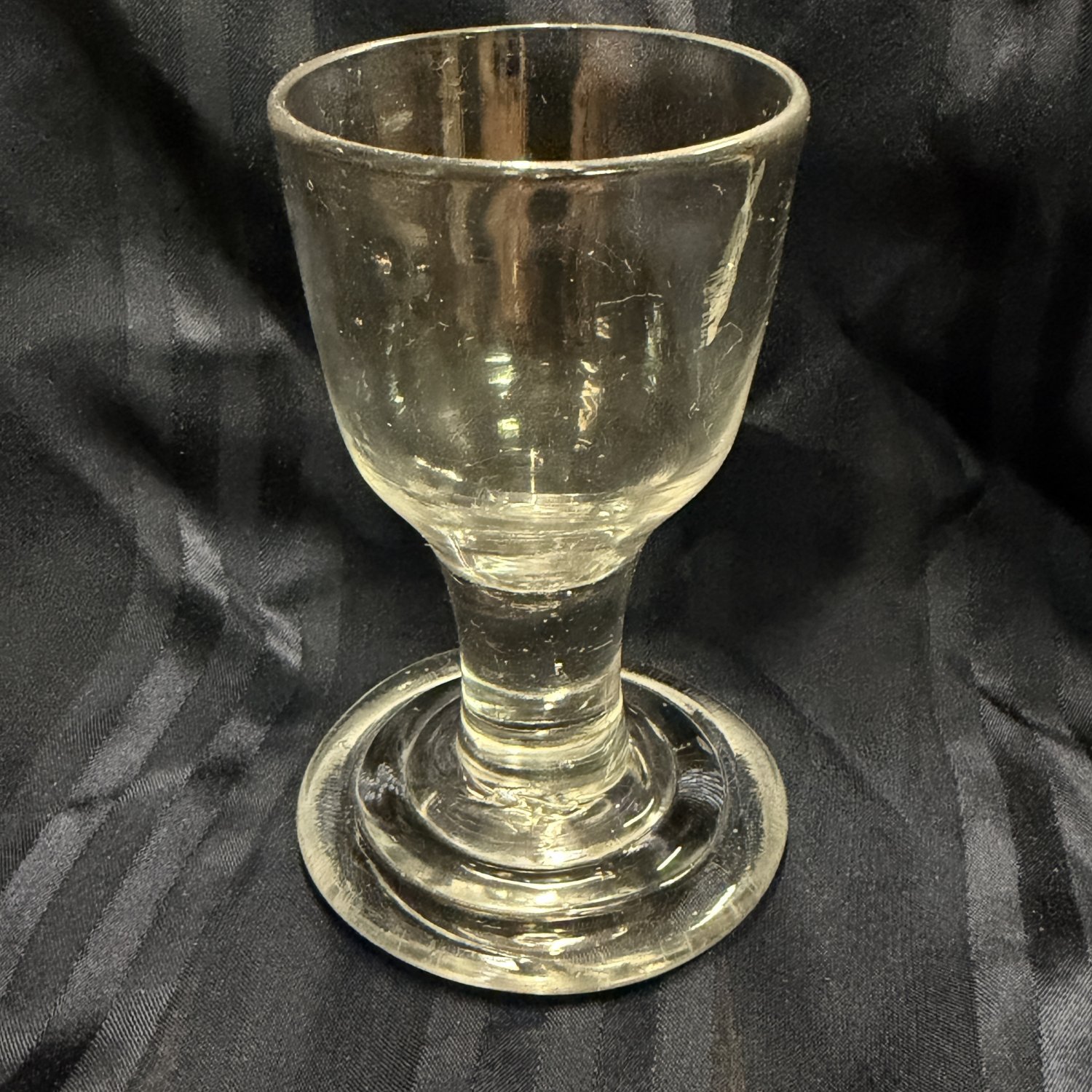 George II step-footed firing glass 