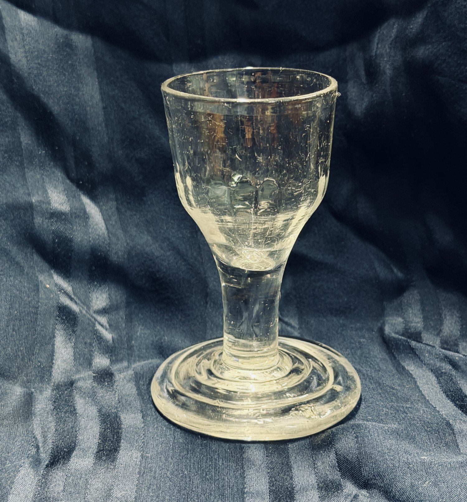 George II step-footed firing glass c1745-55