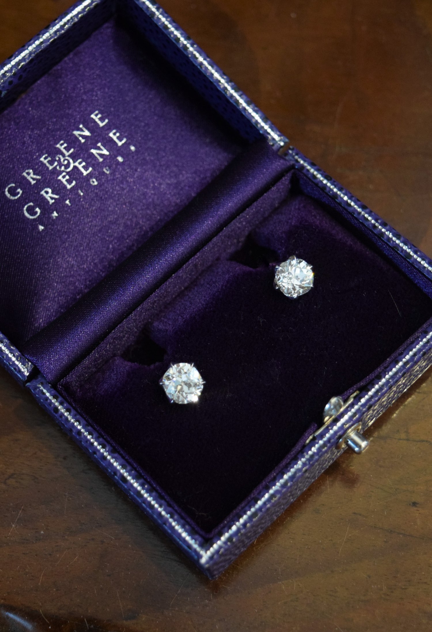 Pair of Russian old mine cut diamonds and platinum earrings