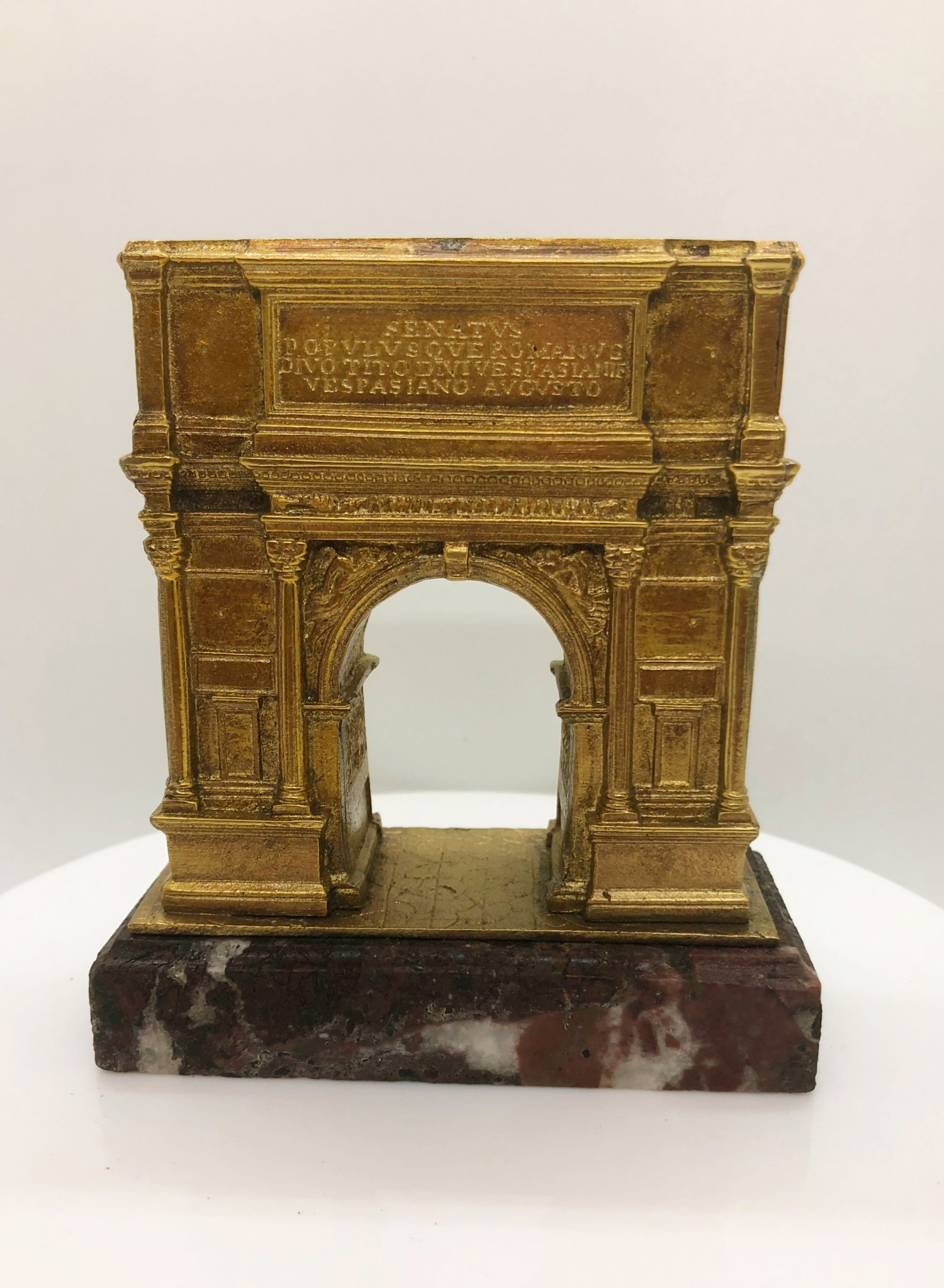 A late 19th century brass and marble model of the Arch of Titus in Rome