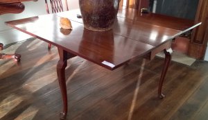 George III pad foot dining table in Cuban mahogany