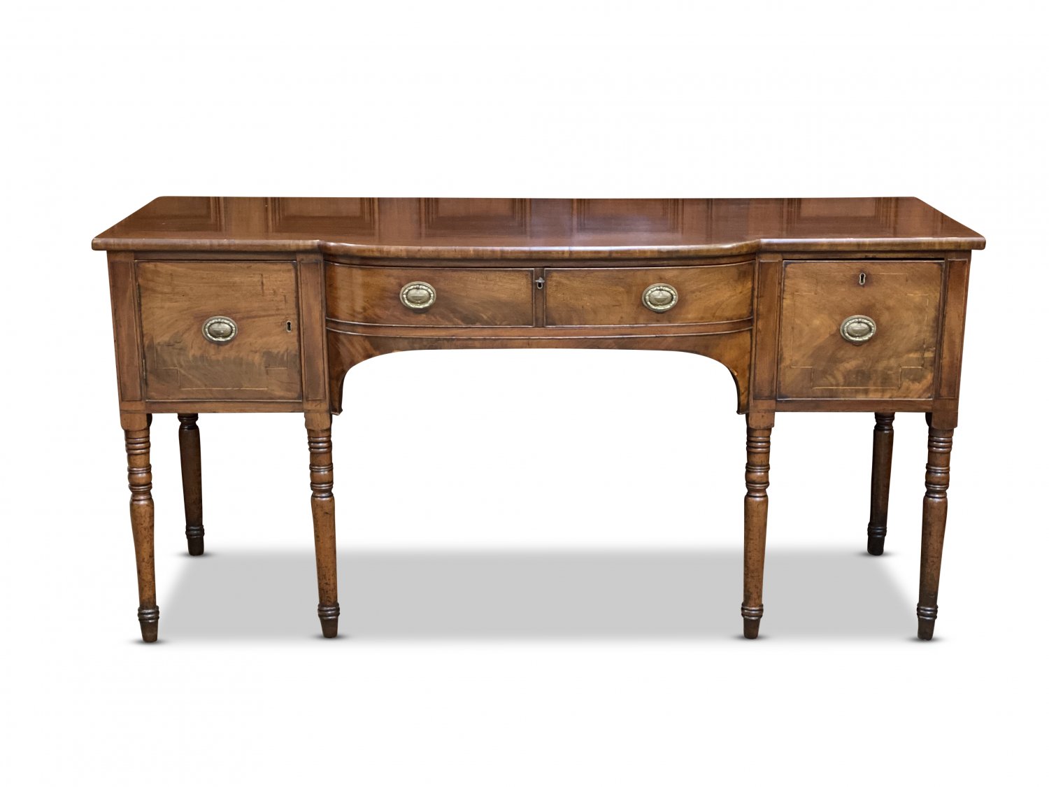Fine quality George III mahogany two-door bow front sideboard with central drawer