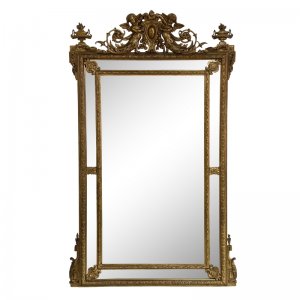 Gilt and floral cushion over mantle mirror