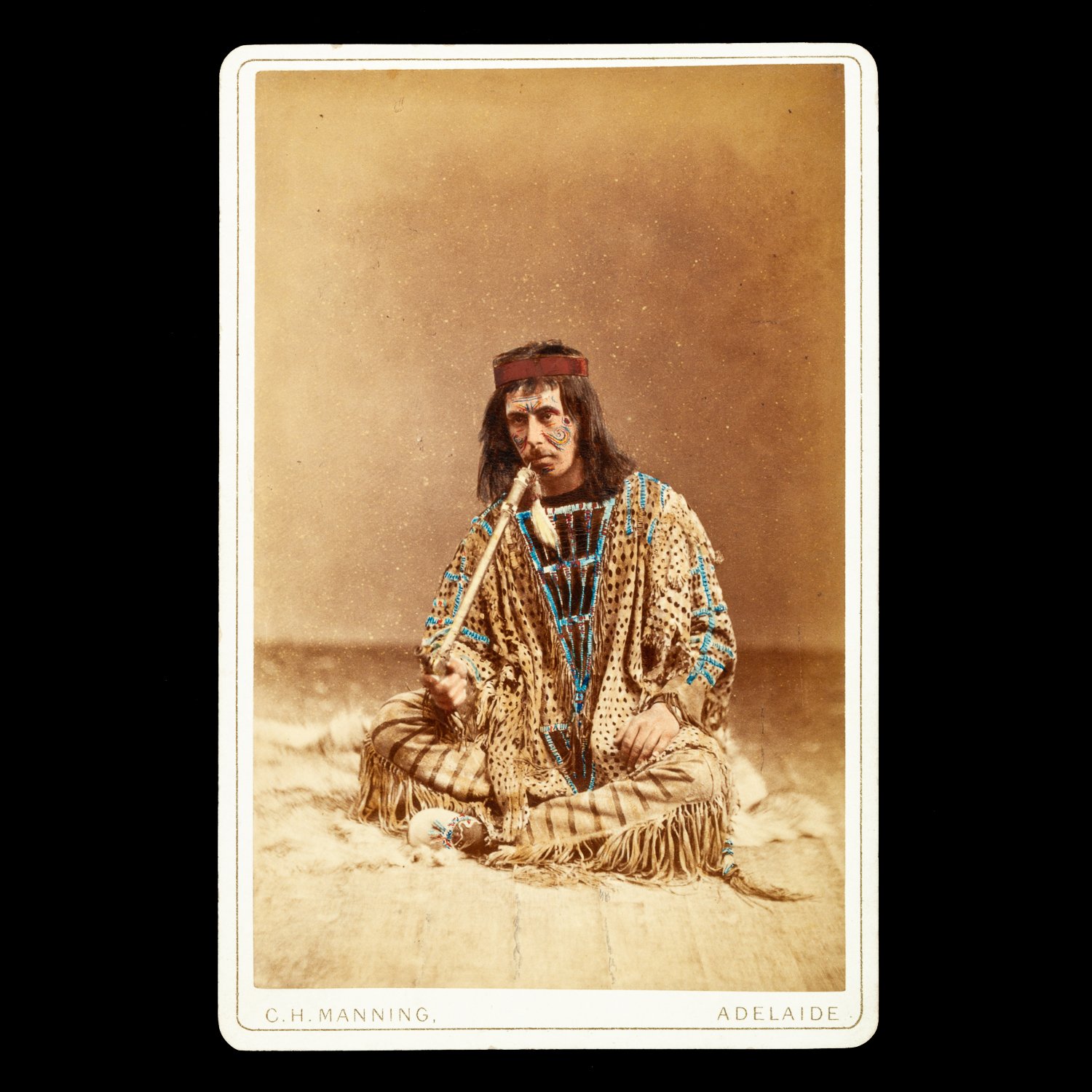 Studio portrait of Aretas William Charles Young dressed as a Native American. Adelaide, late 1870s.