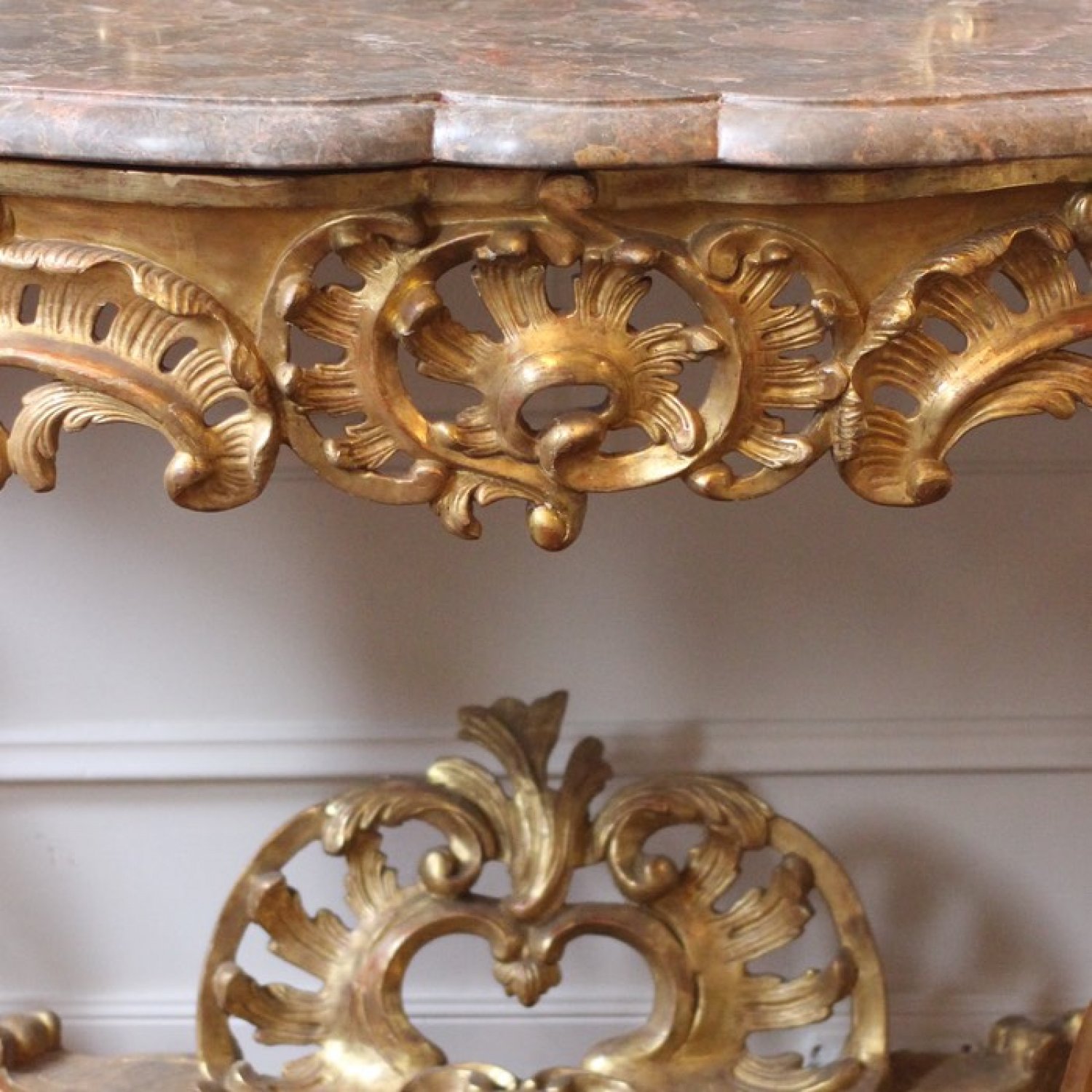 AN 18TH CENTURY, LOUIS XV PERIOD ARC-EN-ARBALÈTE, GILTWOOD CONSOLE TABLE. CIRCA. 
