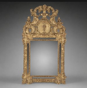An 18th Century French Régence Period Giltwood Mirror. Circa 1715–1720
