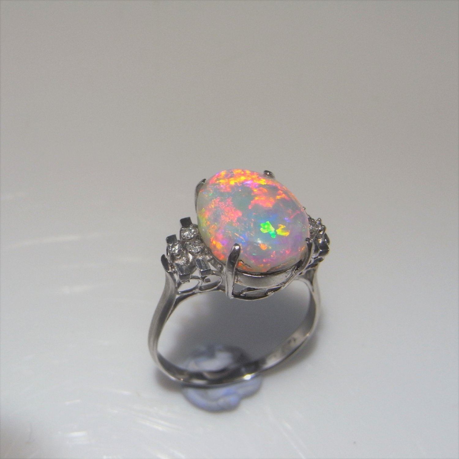 A Large Handmade Natural Australian Opal Diamond Engagement Ring in Platinum