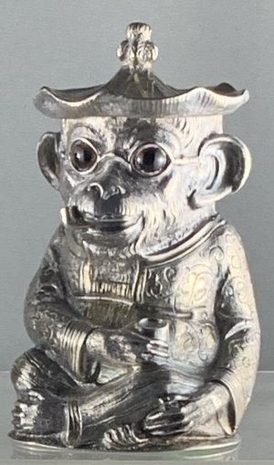 A very rare Victorian novelty silver mustard pot, modelled in the form of a seated monkey. EC Brown, London 1867. $24,000.