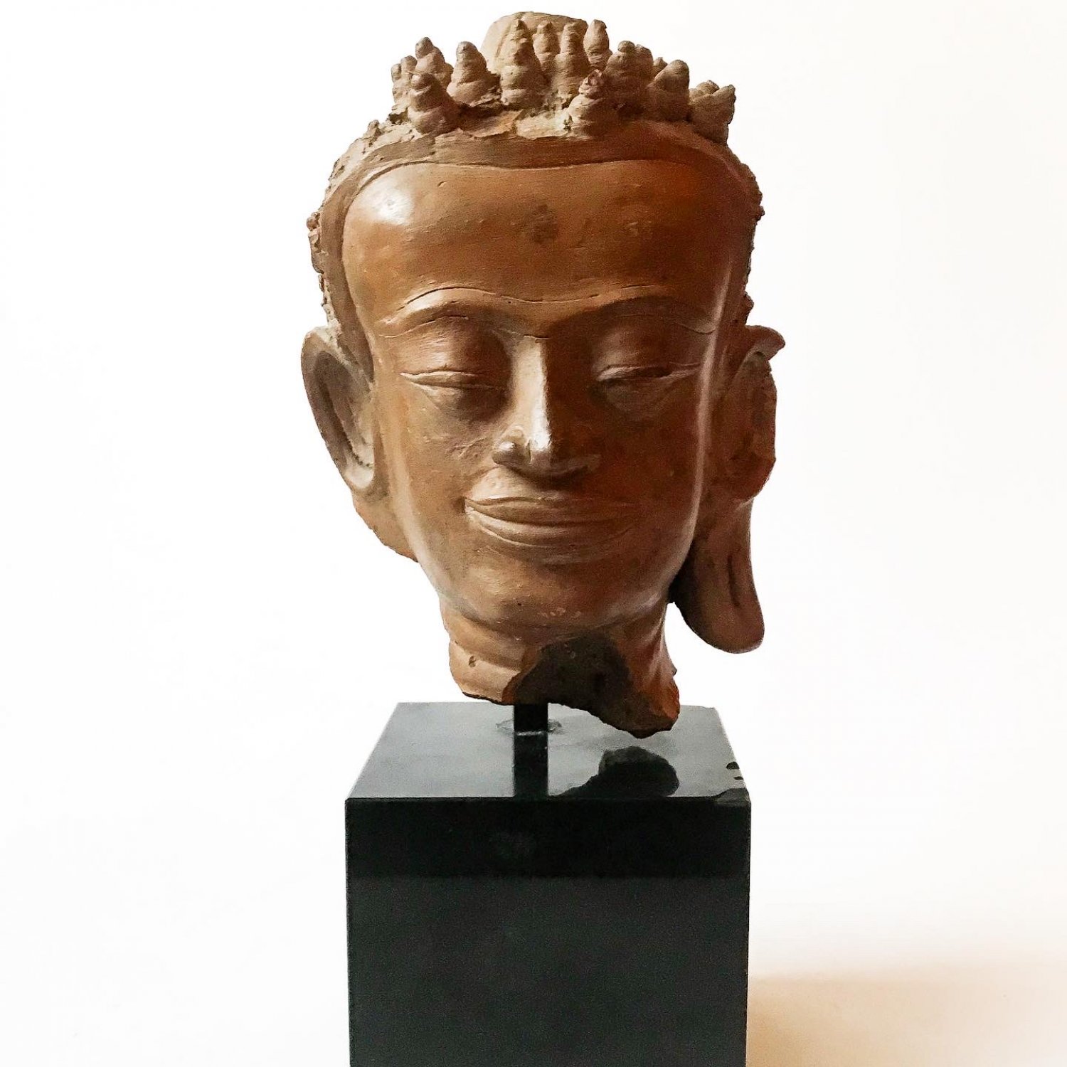 Burnished terracotta Haripunjaya style head 
