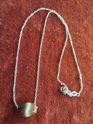 Necklace with an ancient Bead, on a silver chain.