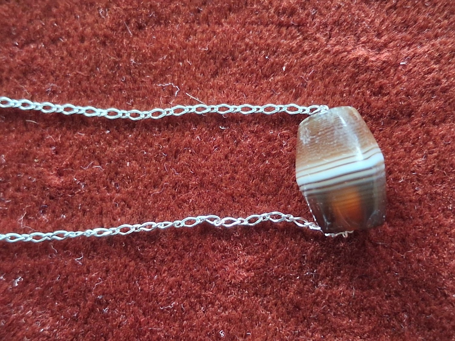 Necklace with an ancient Bead, on a silver chain.