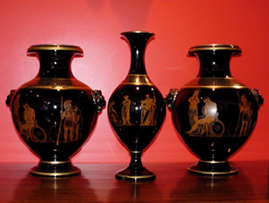 An arrangement of three Victorian vases