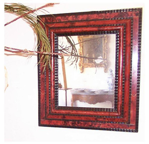 A tortoiseshell inlaid mirror