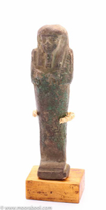 Egyptian shabti figure in pale green faience, late period, 700-300 BC