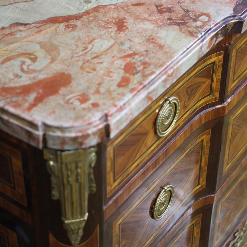 A LOUIS XV/XVI TRANSITIONAL ORMOLU-MOUNTED ROSEWOOD, TULIPWOOD AND FRUITWOOD COMMODE, STAMPED JEAN-MARTIN SCHILER  CIRCA.