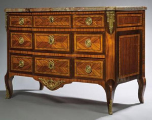 A LOUIS XV/XVI TRANSITIONAL ORMOLU-MOUNTED ROSEWOOD, TULIPWOOD AND FRUITWOOD COMMODE, STAMPED JEAN-MARTIN SCHILER  CIRCA.